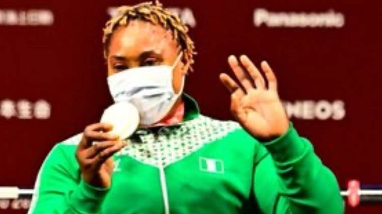 Omolayo wins powerlifting silver
