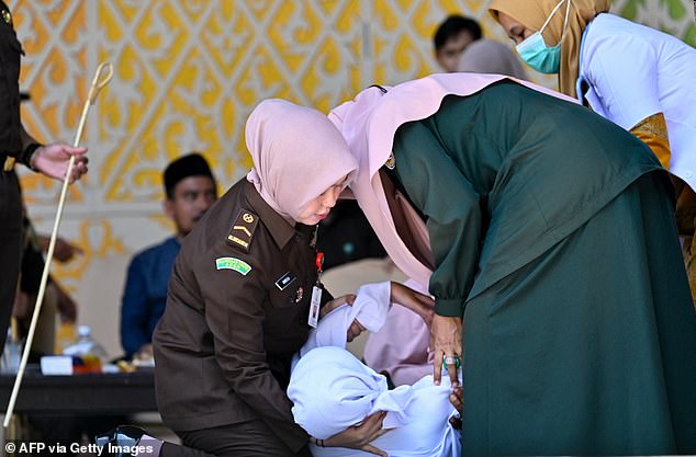 Woman collapses after she is lashed 140 times for having s£x outside of marriage and drinking alcohol (Photos)